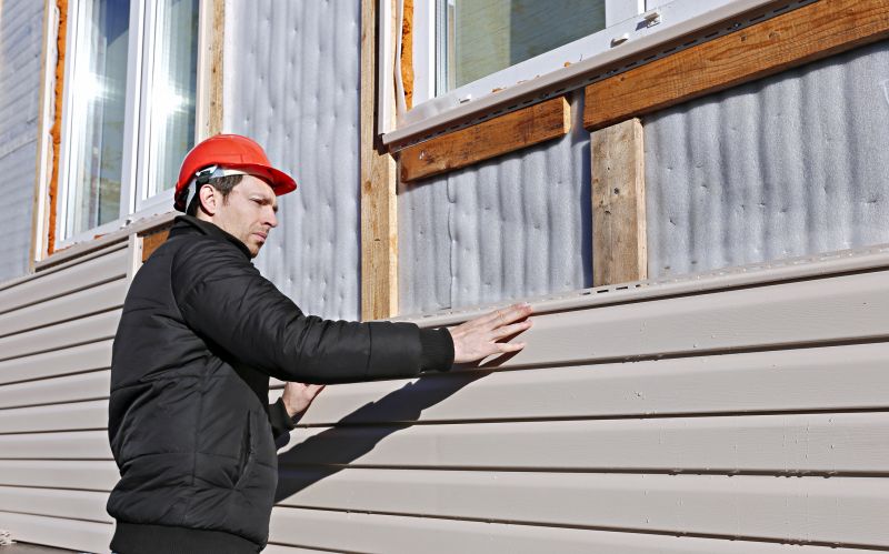 Professional Siding Installer Measuring
